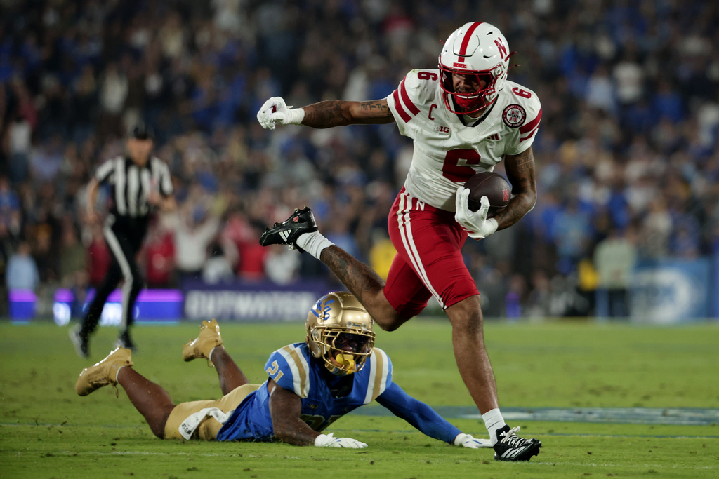 Nebraska wide receiver Dane Key (6) runs the ball against UCLA during the first half of an NCAA college football game, Saturday, Nov. 8, 2025, in Pasadena, Calif. (AP Photo/Ethan Swope)