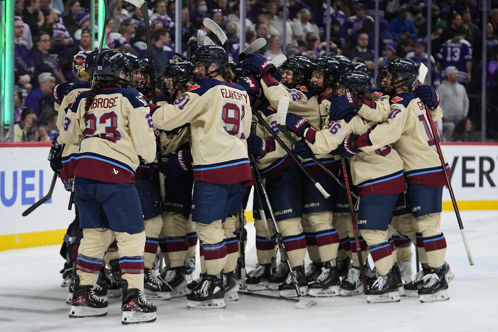 Montreal Victoire players celebrate after game 3 of a PWHL hockey semifinals game against the Minnesota Frost, Thursday, May 7, 2026, in St. Paul, Minn. (AP Photo/Abbie Parr)