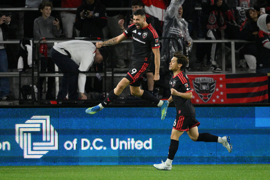 D.C. United forward Tai Baribo (9) celebrates his goal next to defender Keisuke Kurokawa, right, during the second half of an MLS soccer match against CF Montreal, Saturday, May 23, 2026, in Washington. (AP Photo/Nick Wass)