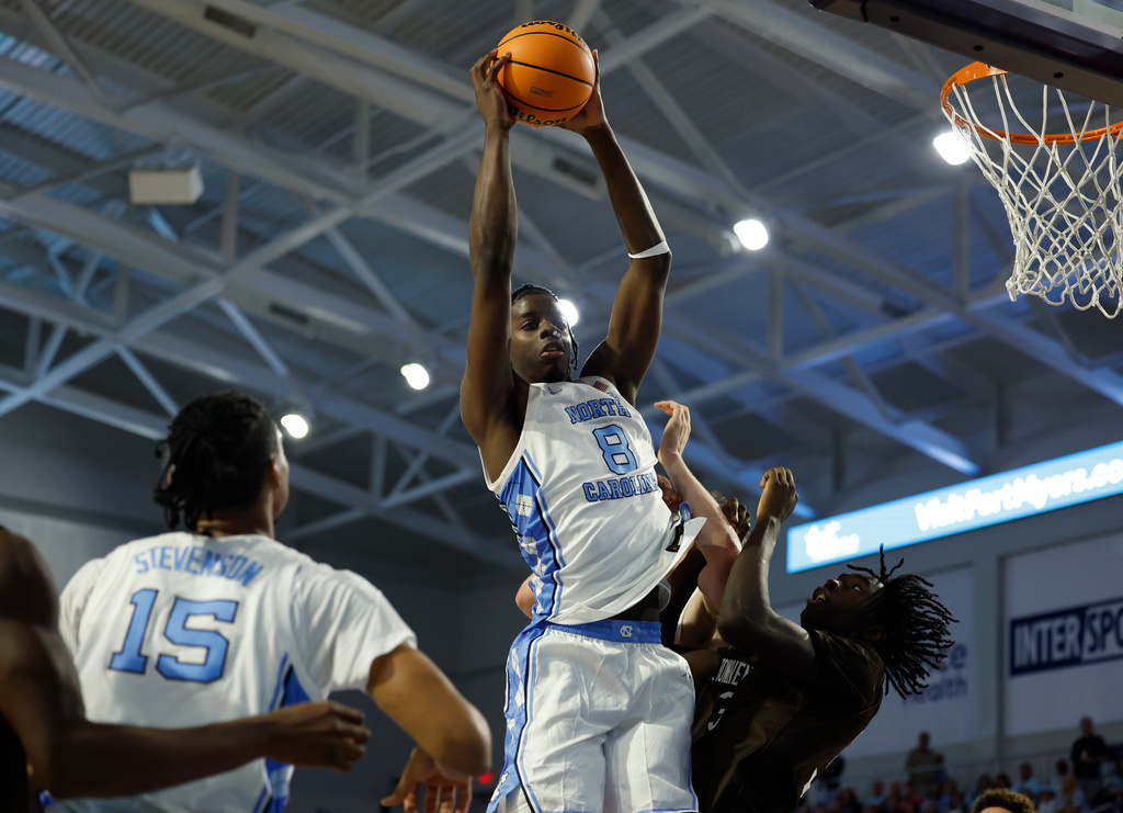North Carolina forward Caleb Wilson rebounds the ball against St. Bonaventure during the second half of an NCAA college basketball game, Tuesday, Nov. 25, 2025 in Ft. Myers, Fla. (AP Photo/Scott Audette)