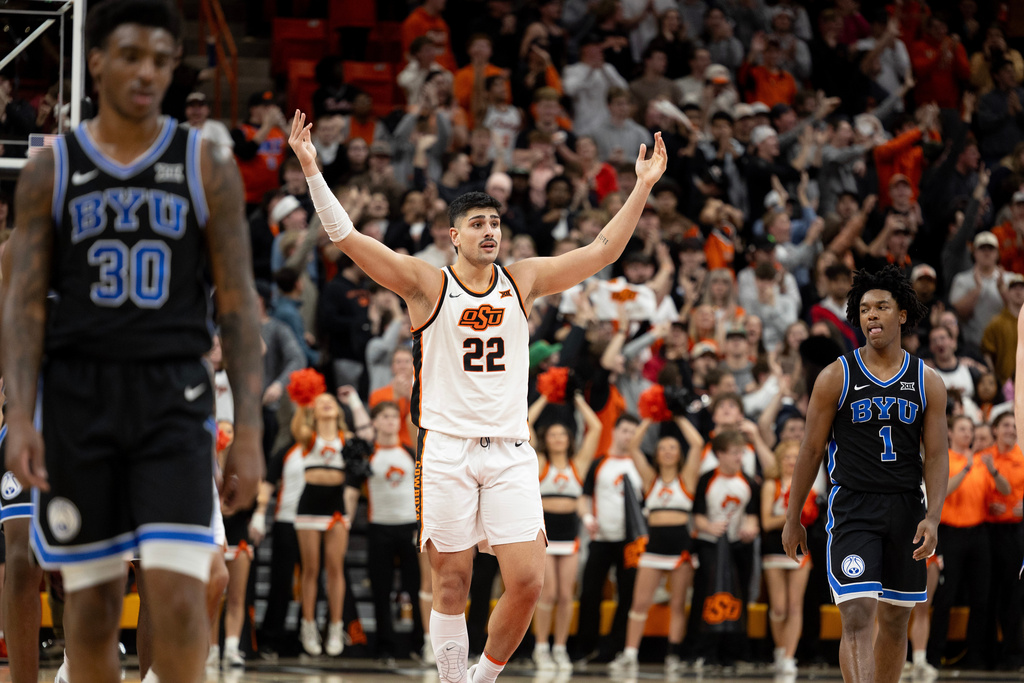 Oklahoma State center Parsa Fallah (22) celebrates in the second half of an NCAA college basketball game against BYU, Wednesday, Feb. 4, 2026 in Stillwater, Okla. (AP Photo/Mitch Alcala)