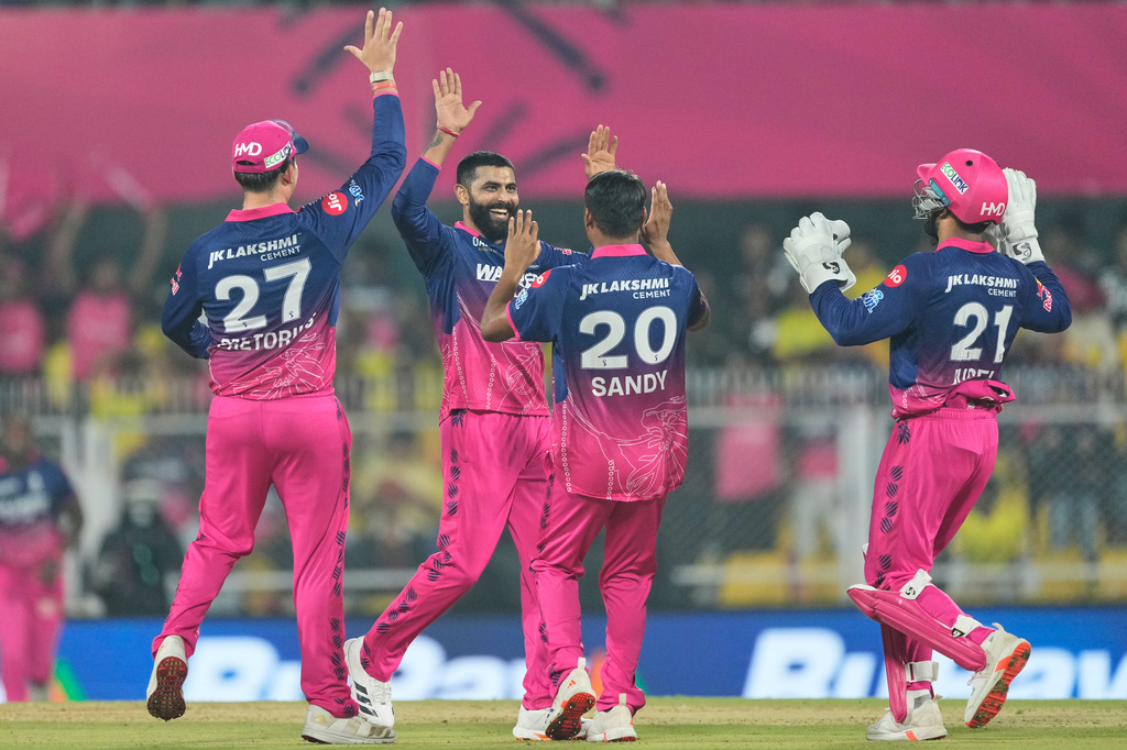 Rajasthan Royals' Ravindra Jadeja, second left, celebrates with teammates the wicket of Chennai Super Kings' Shivam Dube during the Indian Premier League cricket match between Chennai Super Kings and Rajasthan Royals in Guwahati, India, Monday, March 30, 2026. (AP Photo/Anupam Nath)
