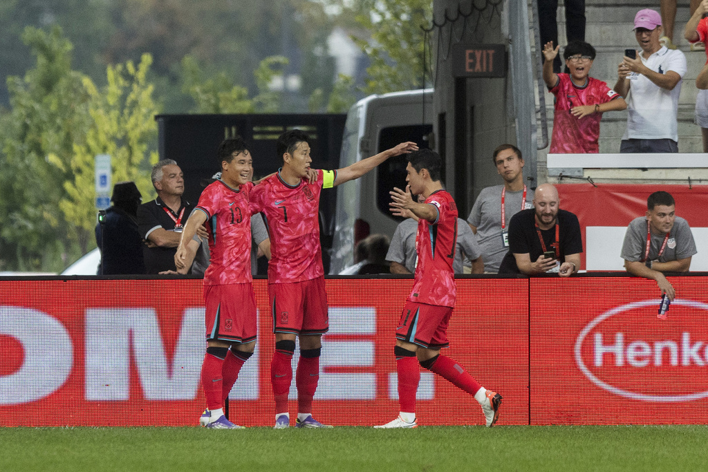 South Korea's Son Heung-min, center, celebrates his goal with team mates during a friendly soccer match against United States at Sport Illustrator Stadium on Saturday, Sept. 6, 2025, in Harrison, N.J. (AP Photo/Andres Kudacki)