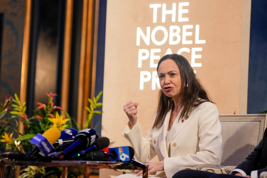 Nobel Peace Prize laureate Maria Corina Machado speaks during a press conference at the Grand Hotel in Oslo, Norway, Thursday, Dec. 11, 2025. (Heiko Junge/NTB Scanpix via AP)