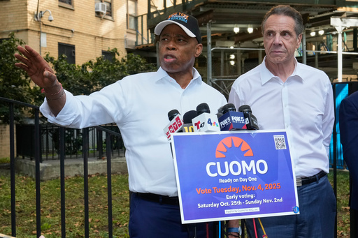 New York Mayor Eric Adams, left, and Democrat mayoral candidate Andrew Cuomo appear at a campaign event outside the George Washington Carver Houses, in New York, Thursday, Oct. 23, 2025. (AP Photo/Richard Drew) New York Mayor Eric Adams, left, and Democrat mayoral candidate Andrew Cuomo appear at a campaign event outside the George Washington Carver Houses, in New York, Thursday, Oct. 23, 2025. (AP Photo/Richard Drew)