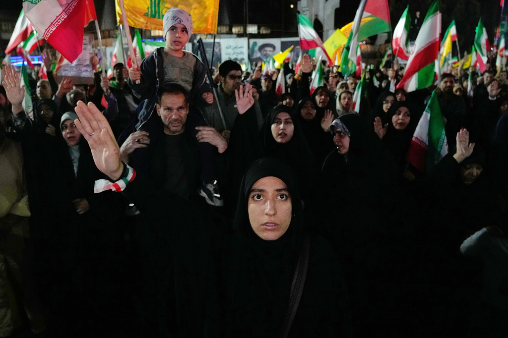 Pro-government demonstrators attend a gathering in Tehran, Iran, Monday, April 27, 2026. (AP Photo/Vahid Salemi)