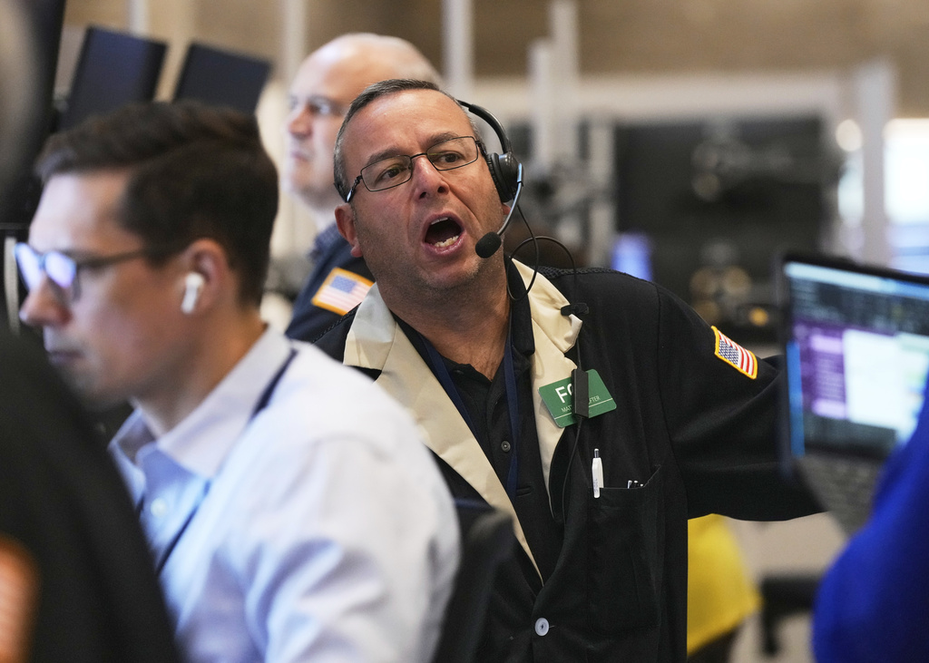 Options trader Matthew Hefter works on the floor of the New York Stock Exchange, Friday, Sept. 5, 2025. (AP Photo/Richard Drew)