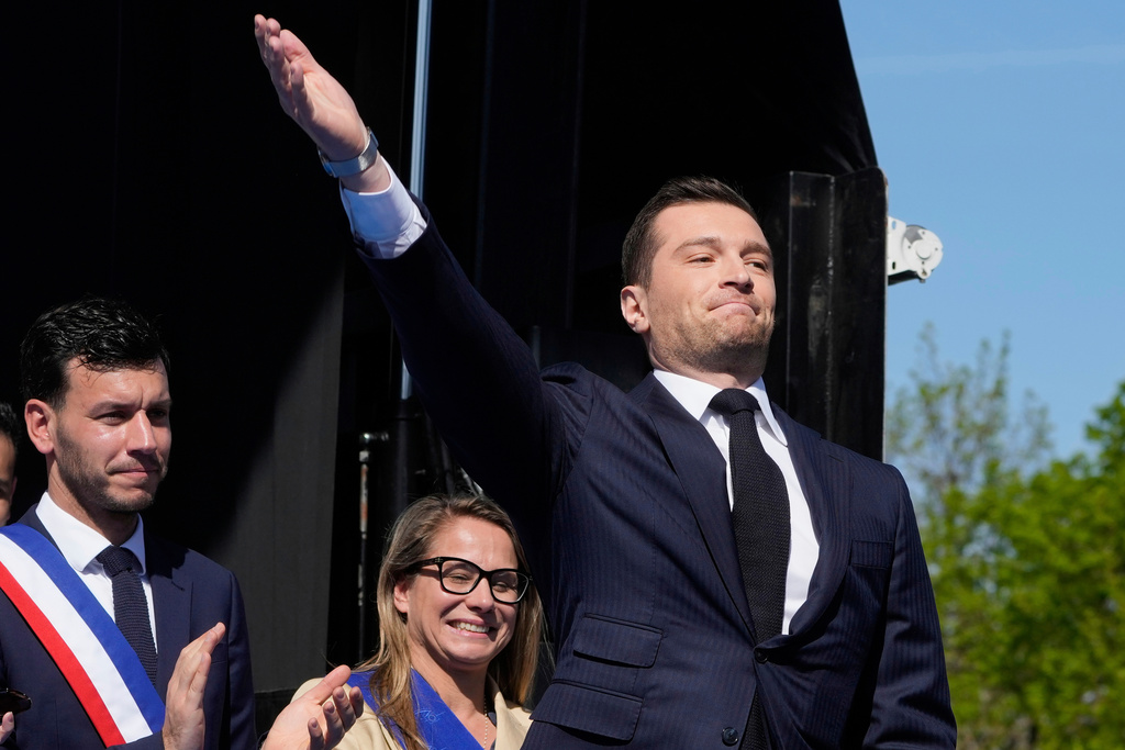 FILE - The leader of France's National Rally (RN) Jordan Bardella arrives as he attends at the French far-right party national rally near the parliament in support of Marine Le Pen in Paris, Sunday, April 6, 2025. (AP Photo/Michel Euler, File)