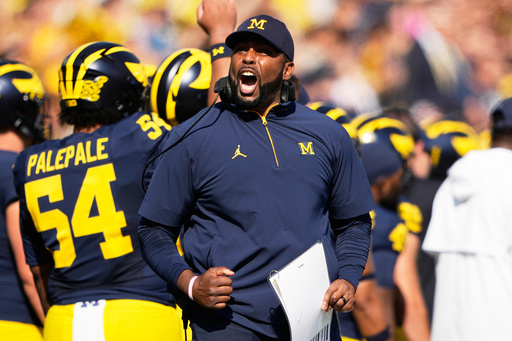 Michigan head coach Sherrone Moore reacts on the sideline during the first half of an NCAA college football game against Washington, Saturday, Oct. 18, 2025, in Ann Arbor, Mich. (AP Photo/Ryan Sun) Michigan head coach Sherrone Moore reacts on the sideline during the first half of an NCAA college football game against Washington, Saturday, Oct. 18, 2025, in Ann Arbor, Mich. (AP Photo/Ryan Sun)