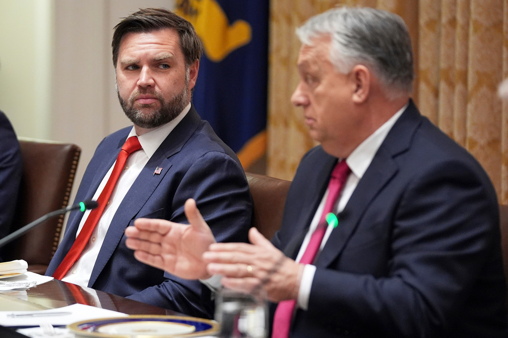 FILE - Vice President JD Vance, left, listens as Hungary's Prime Minister Viktor Orban speaks during a meeting in the Cabinet Room of the White House, Friday, Nov. 7, 2025, in Washington. (AP Photo/Evan Vucci, File)
