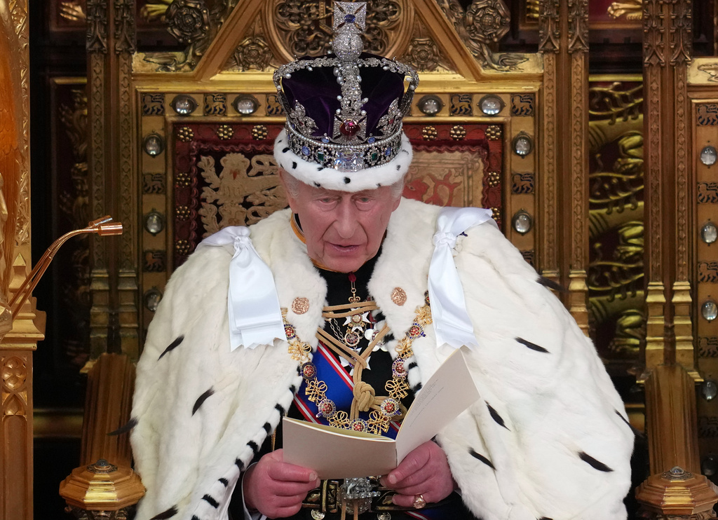 Britain's King Charles III reads out during the State Opening of Parliament at the Palace of Westminster in London, Wednesday, May 13, 2026.(AP Photo/Kirsty Wigglesworth, Pool)