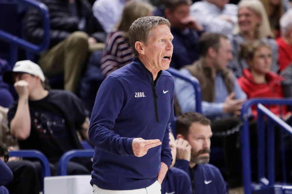 Gonzaga head coach Mark Few directs his team during the first half of an NCAA college basketball game against Portland Wednesday, Feb. 25, 2026, in Spokane, Wash. (AP Photo/Young Kwak)