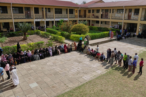 People wait to cast their votes during the general elections at Mpendaye polling station in Zanzibar, Tanzania, Wednesday, Oct. 29, 2025. (AP Photo/Brian Inganga) People wait to cast their votes during the general elections at Mpendaye polling station in Zanzibar, Tanzania, Wednesday, Oct. 29, 2025. (AP Photo/Brian Inganga)