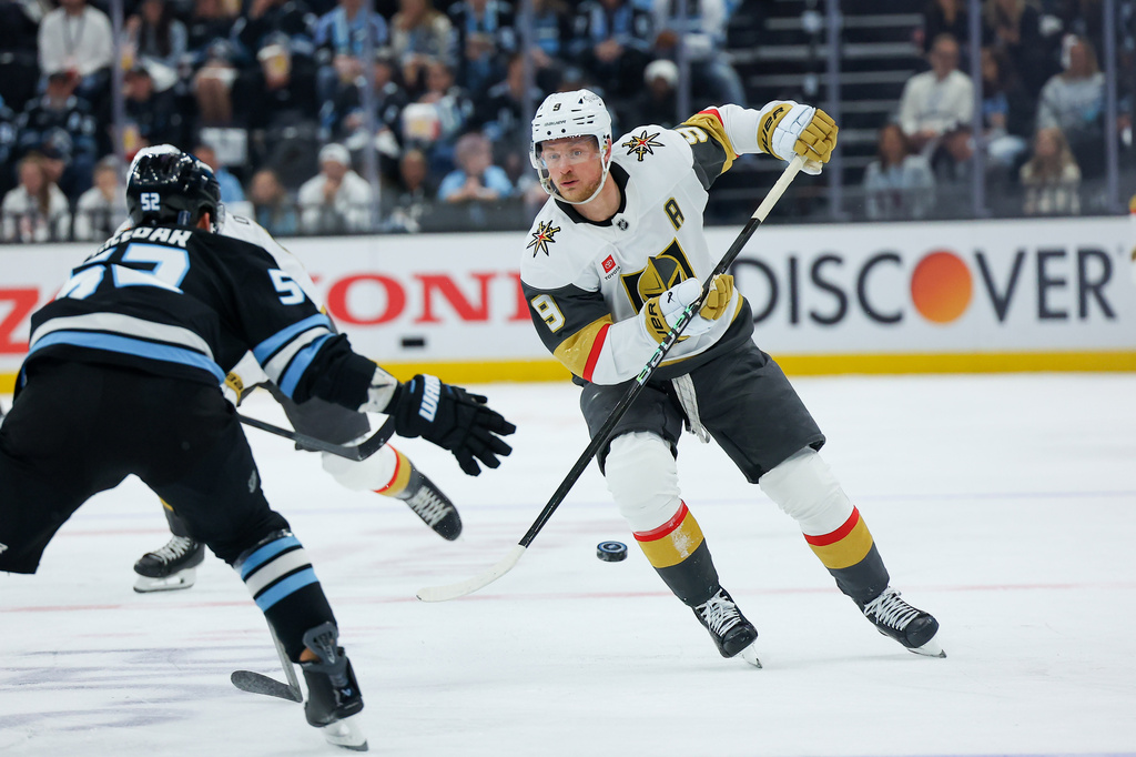 Vegas Golden Knights center Jack Eichel (9) passes the puck during the second period of Game 6 in the first round of an NHL hockey Stanley Cup playoff series against the Utah Mammoth, Friday, May 1, 2026, in Salt Lake City. (AP Photo/Melissa Majchrzak)