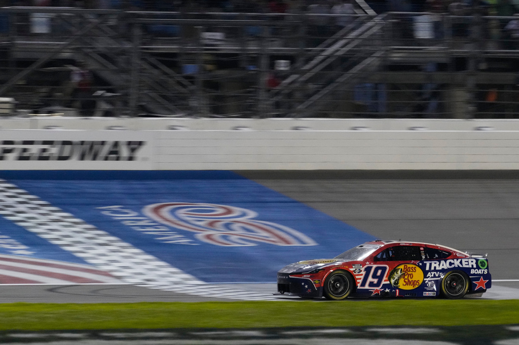 Chase Briscoe (19) crosses the finish line to win a NASCAR Cup Series Eero 400 auto race at Chicagoland Speedway in Joliet, Ill., Sunday, July 5, 2026. (AP Photo/Nam Y. Huh)