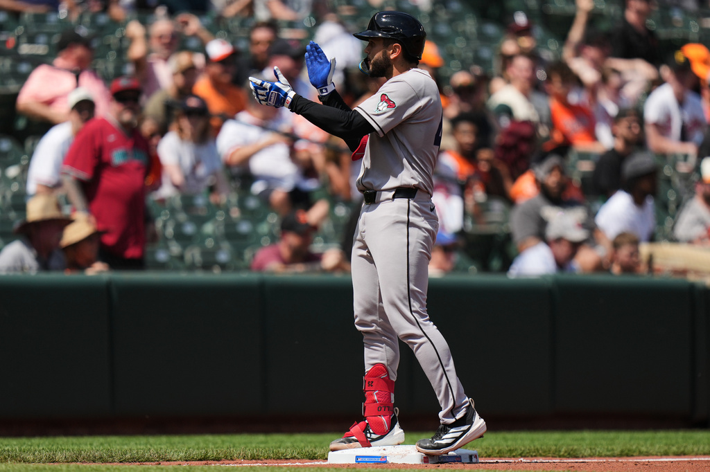 Arizona Diamondbacks' Adrian del Castillo celebrates after hitting a two-run triple during the third inning of a baseball game against the Baltimore Orioles, Wednesday, April 15, 2026, in Baltimore. (AP Photo/Stephanie Scarbrough)