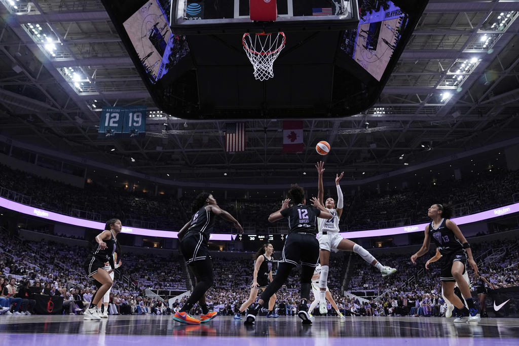 Minnesota Lynx forward Napheesa Collier (24) shoots over Golden State Valkyries center Iliana Rupert (12) during the first half of Game 2 in the first round of the WNBA basketball playoffs Wednesday, Sept. 17, 2025, in San Jose, Calif. (AP Photo/Godofredo A. Vásquez)