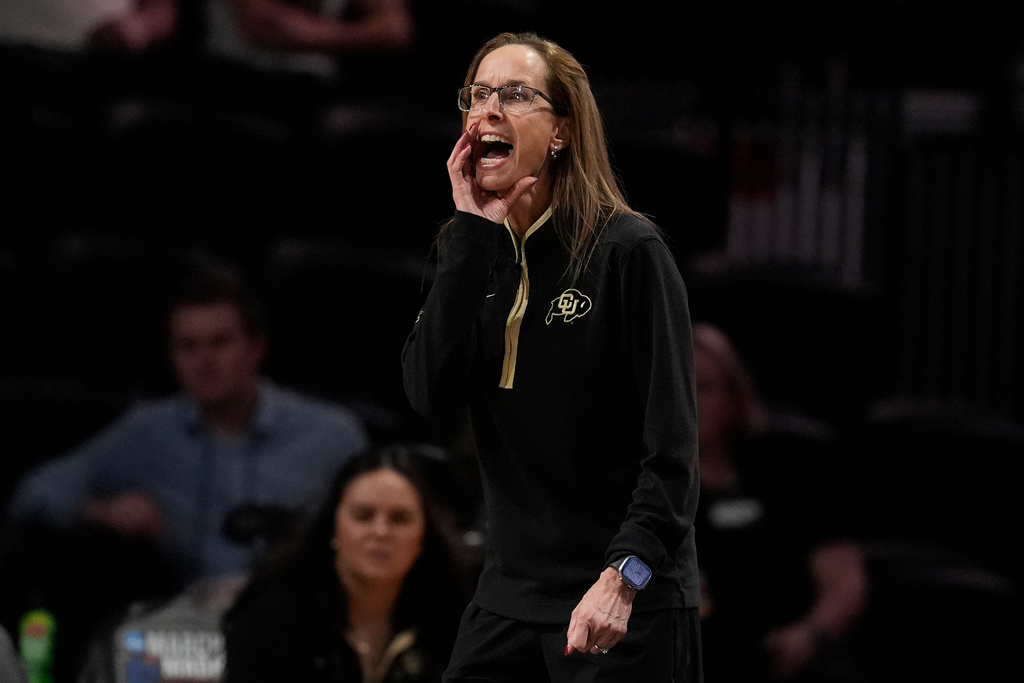 Colorado head coach JR Payne yells to her player during the first half in the first round of the NCAA college basketball tournament against Illinois, Saturday, March 21, 2026, in Nashville, Tenn. (AP Photo/George Walker IV)