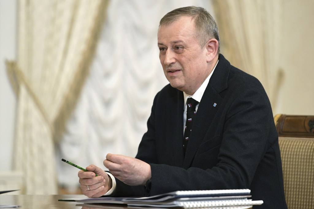 FILE - Leningrad Region Governor Alexander Drozdenko speaks to Russian President Vladimir Putin during their meeting in St. Petersburg, Russia, Monday, Jan. 29, 2024. (Alexei Danichev, Sputnik, Kremlin Pool Photo via AP, File)