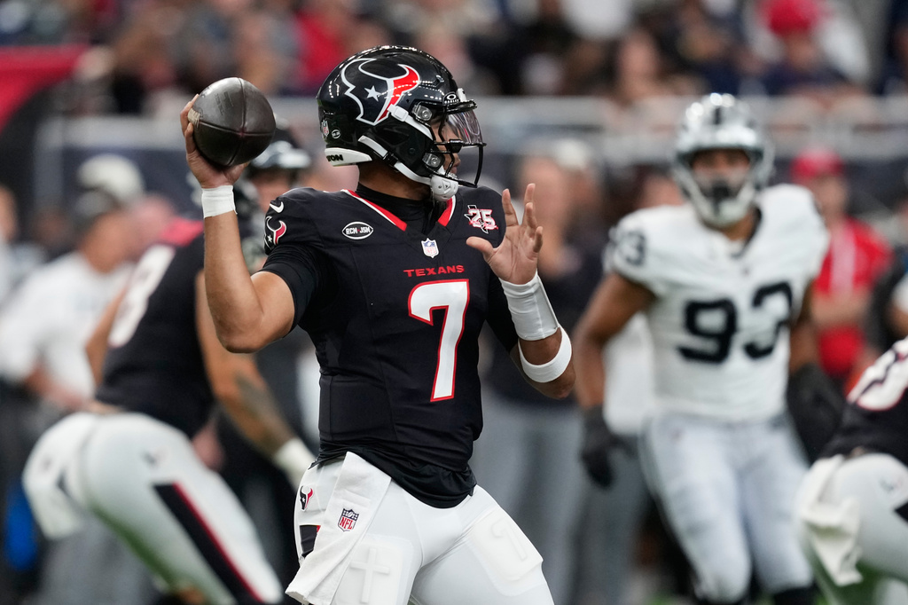Houston Texans quarterback C.J. Stroud (7) throws against the Las Vegas Raiders during the first half of an NFL preseason football game, l Thursday, Aug. 20, 2026, in Houston. (AP Photo/David J. Phillip)