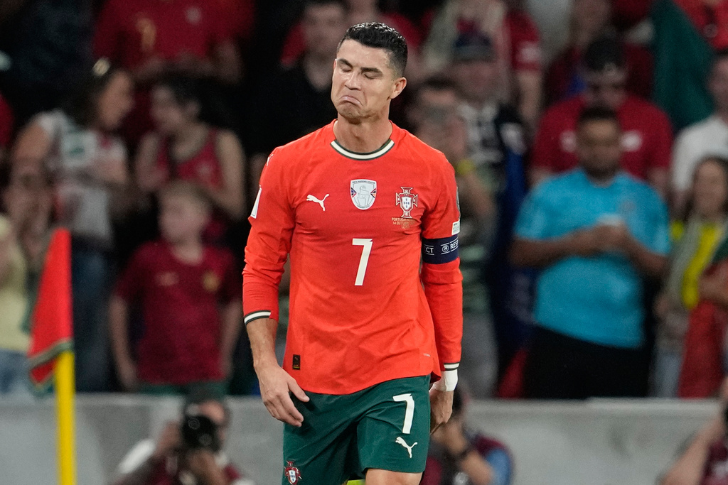 Portugal's Cristiano Ronaldo reacts after scoring during a World Cup 2026 group F qualifying soccer match between Portugal and Hungary in Lisbon, Tuesday, Oct. 14, 2025. (AP Photo/Armando Franca)