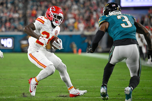 Kansas City Chiefs running back Brashard Smith (24) runs the ball under pressure from Jacksonville Jaguars cornerback Tyson Campbell (3) during the first half of an NFL football game, Monday, Oct. 6, 2025, in Jacksonville, Fla. (AP Photo/Phelan M. Ebenhack) Kansas City Chiefs running back Brashard Smith (24) runs the ball under pressure from Jacksonville Jaguars cornerback Tyson Campbell (3) during the first half of an NFL football game, Monday, Oct. 6, 2025, in Jacksonville, Fla. (AP Photo/Phelan M. Ebenhack)