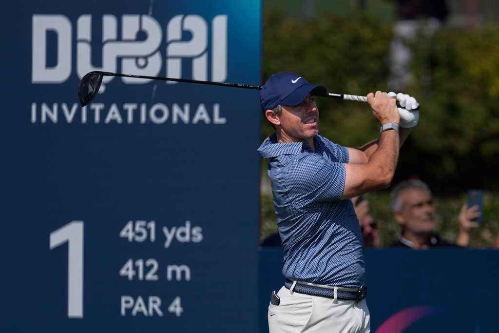 Rory McIlroy of Northern Ireland hits off the first tee during the final round of Dubai Invitational golf tournament in Dubai, United Arab Emirates, Sunday, Jan. 18, 2026. (AP Photo/Altaf Qadri)