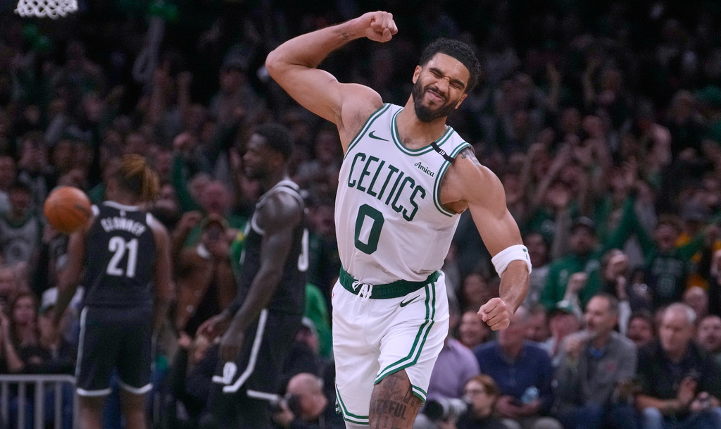Boston Celtics' Jayson Tatum (0) celebrates after hitting a 3-pointer during the second half of an NBA basketball game against the Brooklyn Nets, Tuesday, Oct. 27, 2026, in Boston. (AP Photo/Charles Krupa)