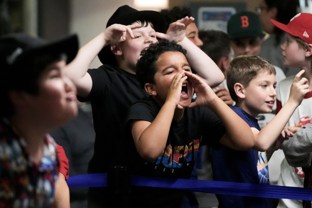 Fans react during a Lucha Libro pro wrestling event at Benicia Public Library Saturday, May 2, 2026, in Benicia, Calif. (AP Photo/Jeff Chiu)