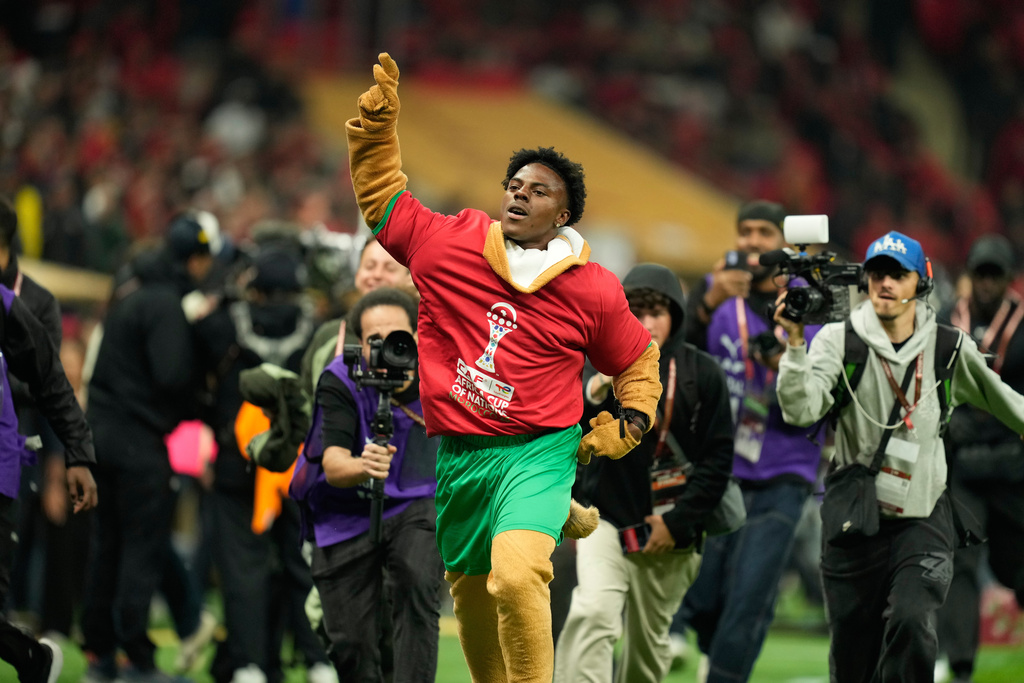 Darren Jason Watkins Jr., American YouTuber known as IShowSpeed, runs during the closing ceremony ahead of the Africa Cup of Nations final soccer match between Senegal and Morocco, in Rabat, Morocco, Sunday, Jan. 18, 2026. (AP Photo/Mosa'ab Elshamy)