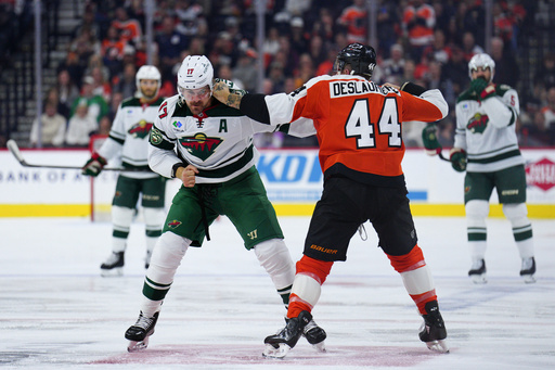 Philadelphia Flyers' Nicolas Deslauriers, right, and Minnesota Wild's Marcus Foligno (44) fight during the first period of an NHL hockey game, Saturday, Oct. 18, 2025, in Philadelphia. (AP Photo/Derik Hamilton) Philadelphia Flyers' Nicolas Deslauriers, right, and Minnesota Wild's Marcus Foligno (44) fight during the first period of an NHL hockey game, Saturday, Oct. 18, 2025, in Philadelphia. (AP Photo/Derik Hamilton)