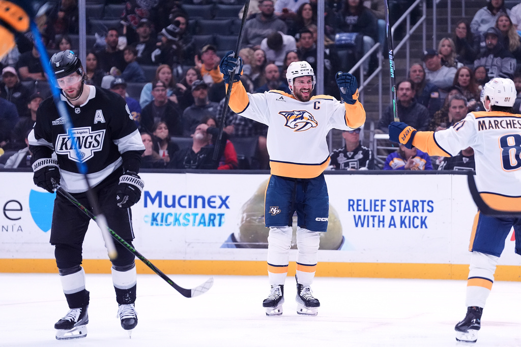 Nashville Predators' defenseman Roman Josi (5) celebrates his goal as Los Angeles Kings' Adrian Kempe (9) skates away during the third period of an NHL hockey game Monday, April 6, 2026, in Los Angeles. (AP Photo/Scott Strazzante)