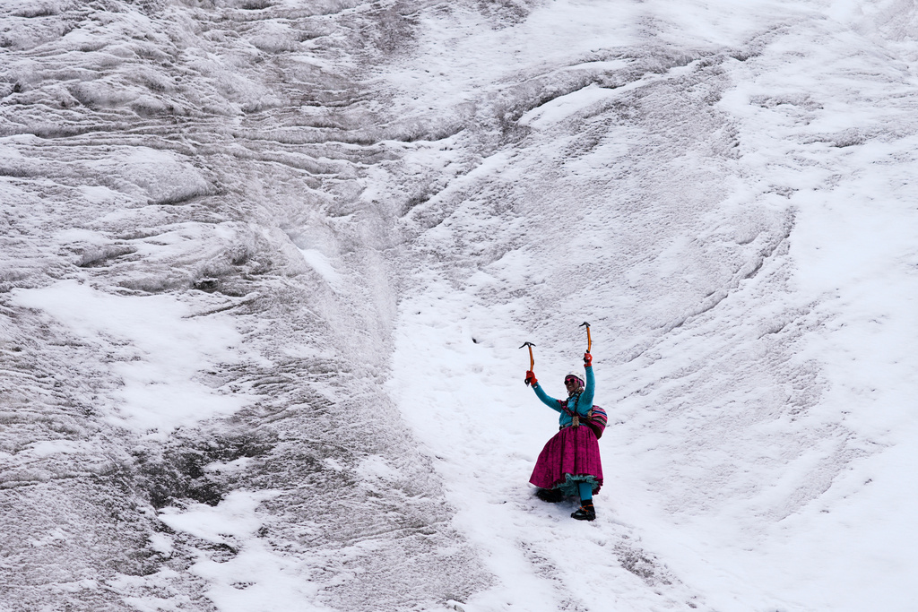 Mountain guide Ana Lia Gonzales climbs the Huayna Potosí glacier near El Alto, Bolivia, Monday, April 14, 2025. (AP Photo/Juan Karita)