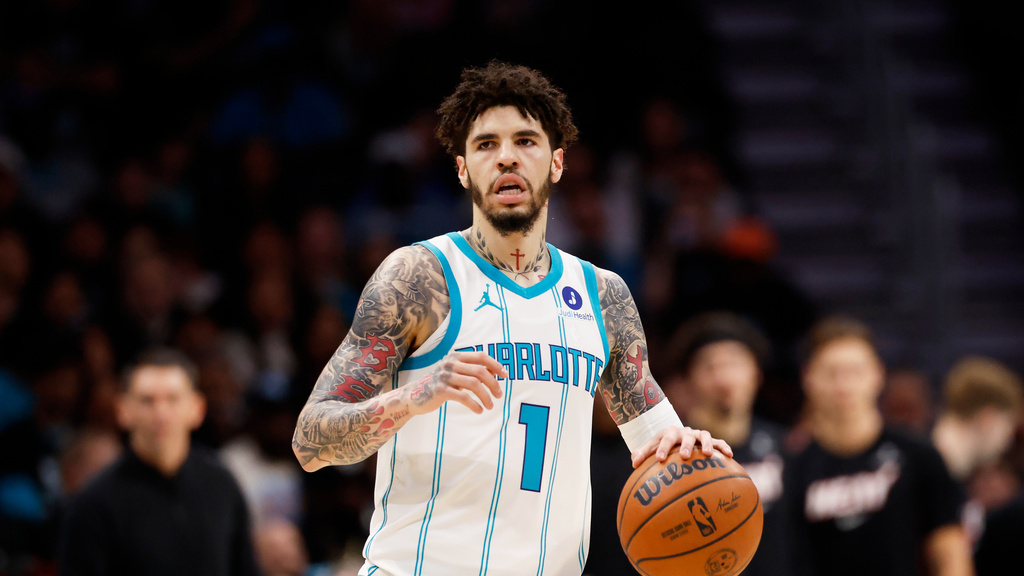 FILE - Charlotte Hornets guard LaMelo Ball brings the ball up the court against the Miami Heat during the first half of an NBA play-in tournament basketball game in Charlotte, N.C., April 14, 2026. (AP Photo/Nell Redmond, file)