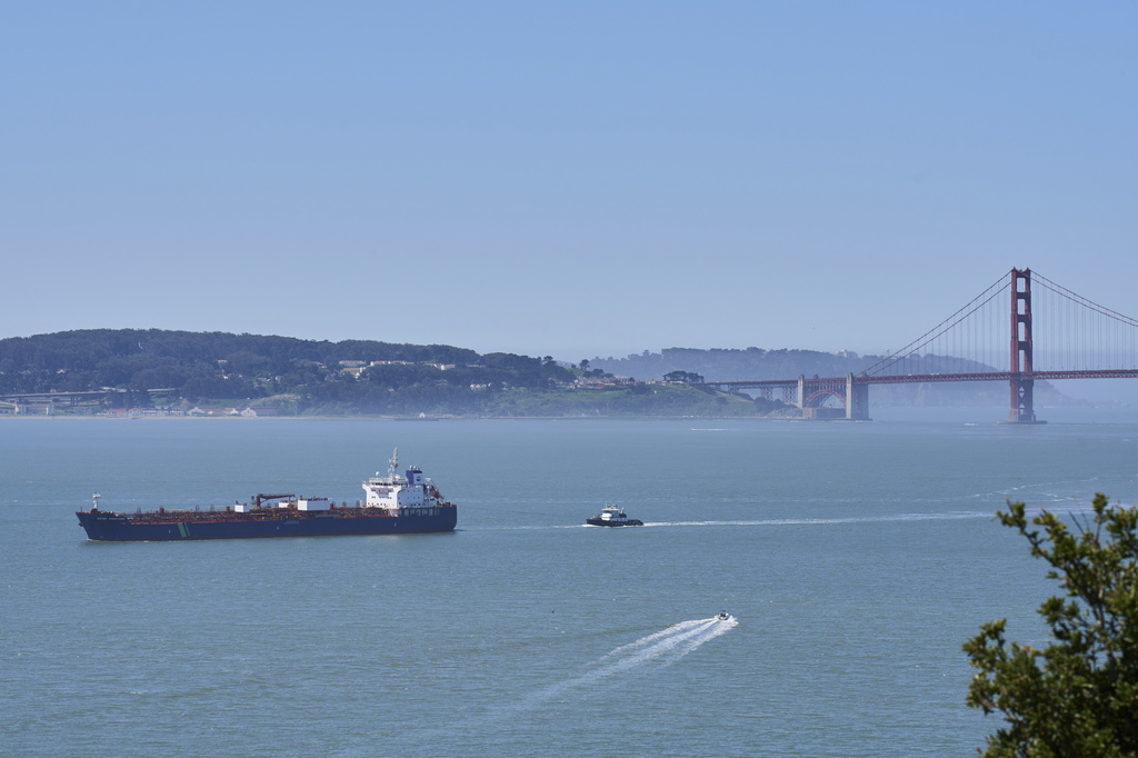 A tanker and other vessels pass through the San Francisco Bay, Tuesday, May 19, 2026. (AP Photo/Annika Hammerschlag)