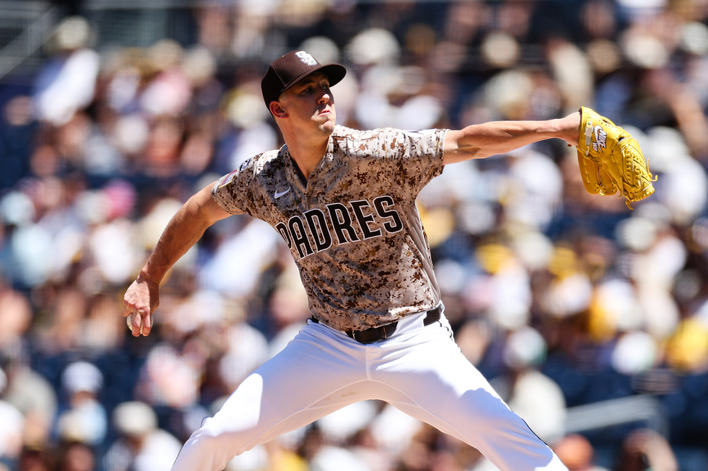 San Diego Padres pitcher Walker Buehler works against the Minnesota Twins in the first inning of a baseball game Sunday, Aug. 23, 2026, in San Diego. (AP Photo/Derrick Tuskan)