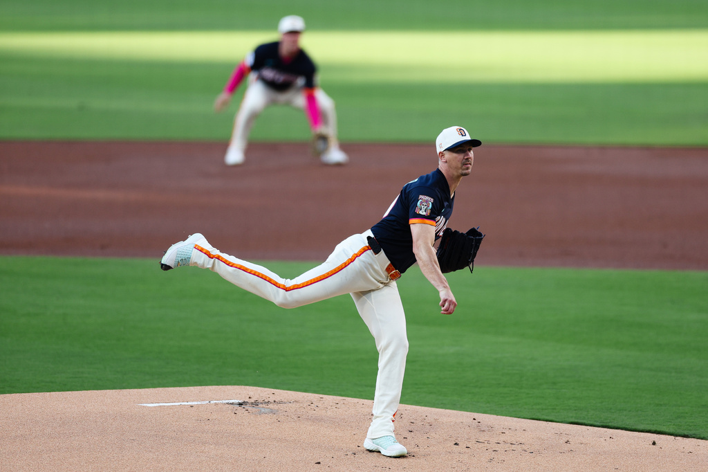 San Diego Padres' Walker Buehler follows through on a pitch against the Los Angeles Dodgers in the first inning of a baseball game, Friday, June 26, 2026, in San Diego. (AP Photo/Derrick Tuskan)