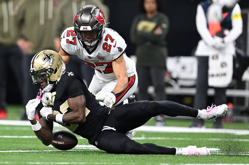 New Orleans Saints wide receiver Rashid Shaheed (22) can't hang onto the ball in front of Tampa Bay Buccaneers cornerback Zyon McCollum (27) during the second half of an NFL football game Sunday, Oct. 26, 2025, in New Orleans. (AP Photo/Ella Hall) New Orleans Saints wide receiver Rashid Shaheed (22) can't hang onto the ball in front of Tampa Bay Buccaneers cornerback Zyon McCollum (27) during the second half of an NFL football game Sunday, Oct. 26, 2025, in New Orleans. (AP Photo/Ella Hall)