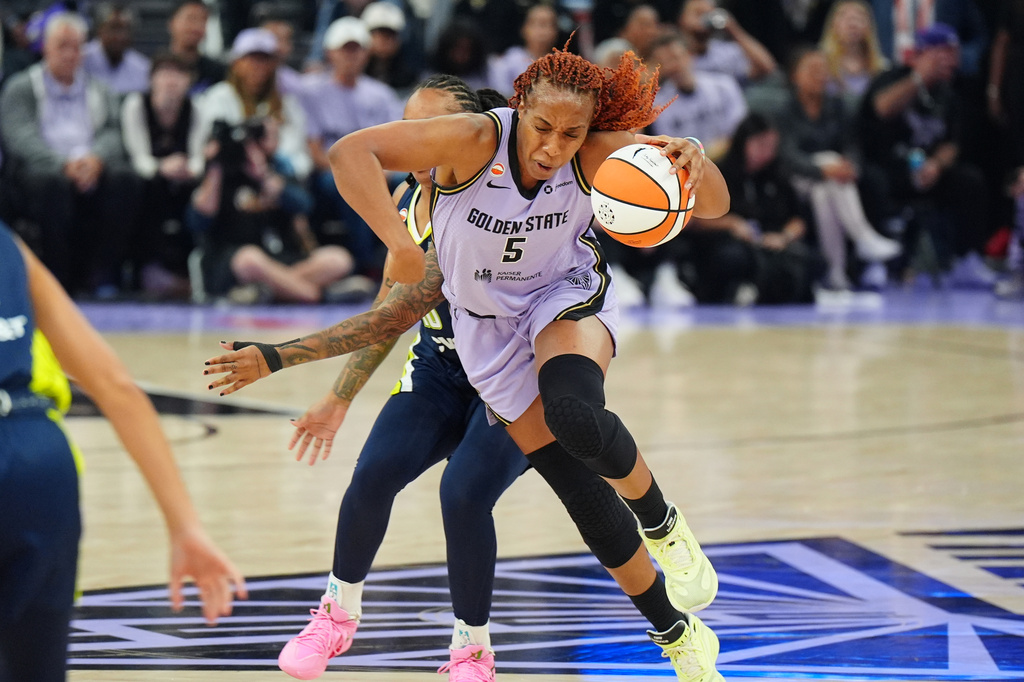Golden State Valkyries forward Kayla Thornton (5) drives to the basket during the first half of a WNBA basketball first-round playoff game against the Dallas Wings Sunday, Sept. 27, 2026, in San Francisco. (AP Photo/Alan Greth)