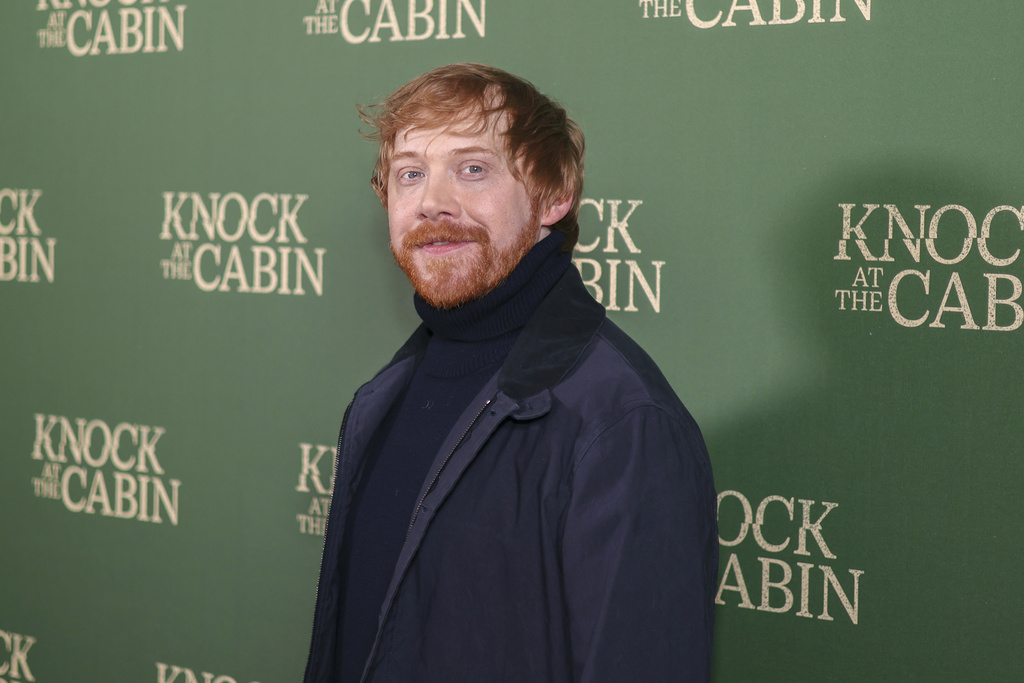 FILE - Rupert Grint poses for photographers upon arrival at the special screening of the film 'Knock at the Cabin' in London, Wednesday, Jan. 25, 2023. (Photo by Vianney Le Caer/Invision/AP, File)