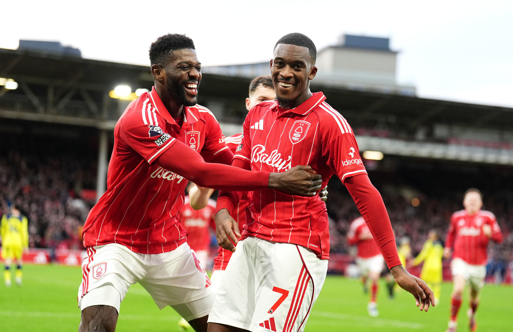 Nottingham Forest's Callum Hudson-Odoi celebrates scoring their side's second goal during their English Premier League soccer match in Nottingham, Sunday, Dec. 14, 2025. (Martin Rickett/PA via AP)