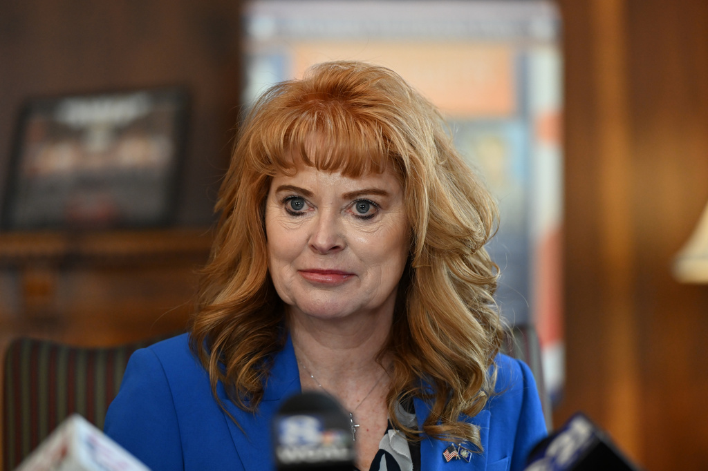 Pennsylvania state Treasurer Stacy Garrity listens to a question during a news conference in Treasury Department offices, Thursday, April 23, 2026, in Harrisburg, Pa. (AP Photo/Marc Levy)
