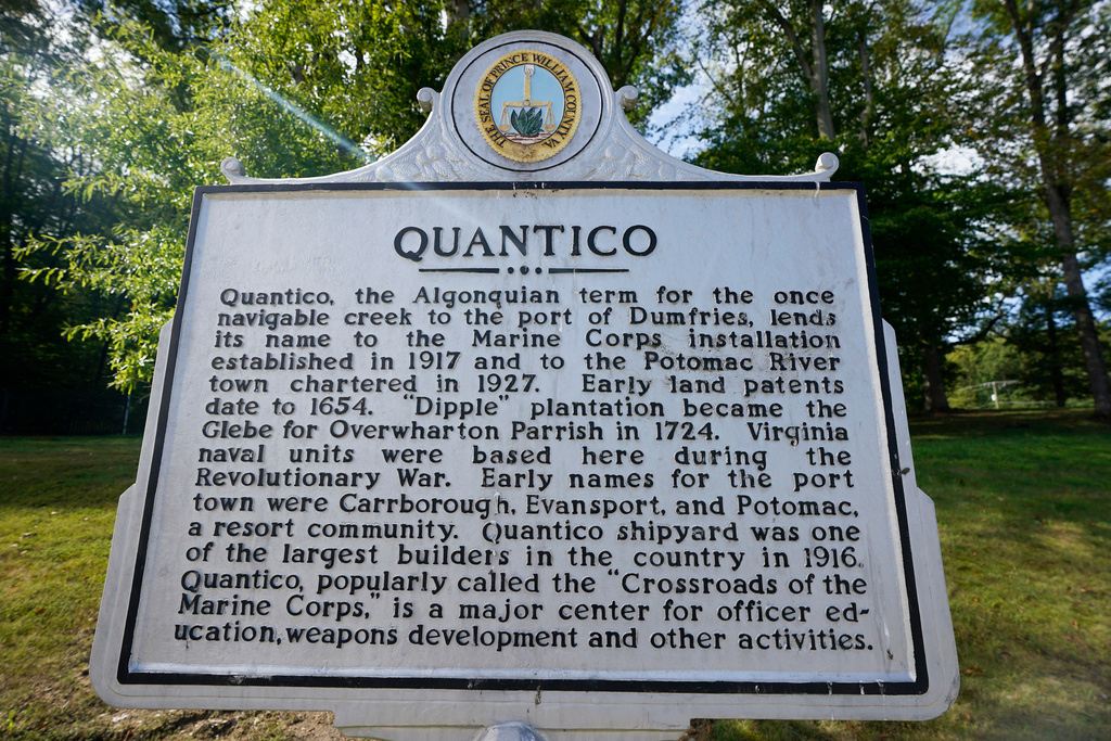 A historical marker is pictured at the entrance of Marine Base Quantico, Friday Sep. 26, 2025, in Quantico, Va. (AP Photo/Steve Helber)