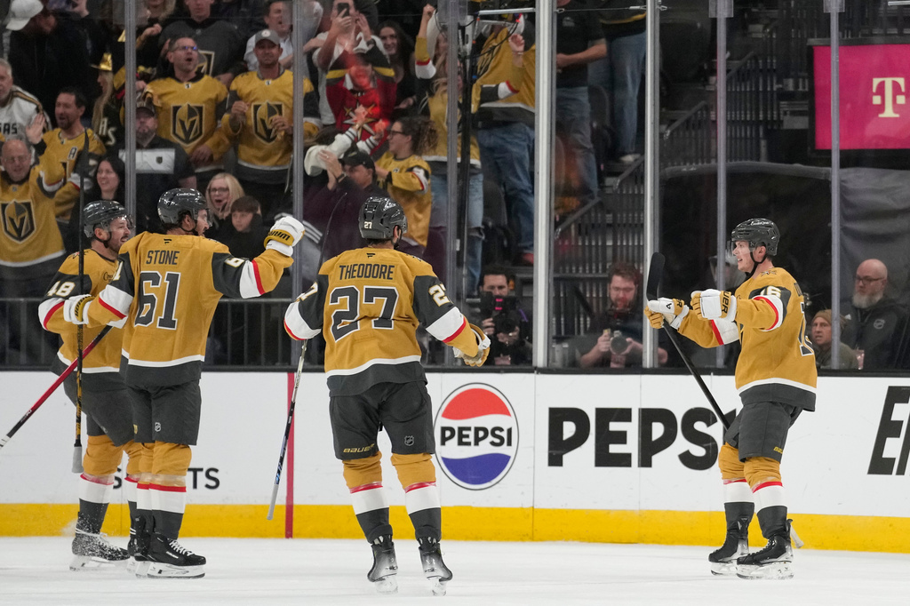 Vegas Golden Knights right wing Pavel Dorofeyev, right, celebrates after scoring against the Utah Mammoth during the first period of Game 5 of a first-round NHL hockey Stanley Cup playoff series Wednesday, April 29, 2026, in Las Vegas. (AP Photo/John Locher)