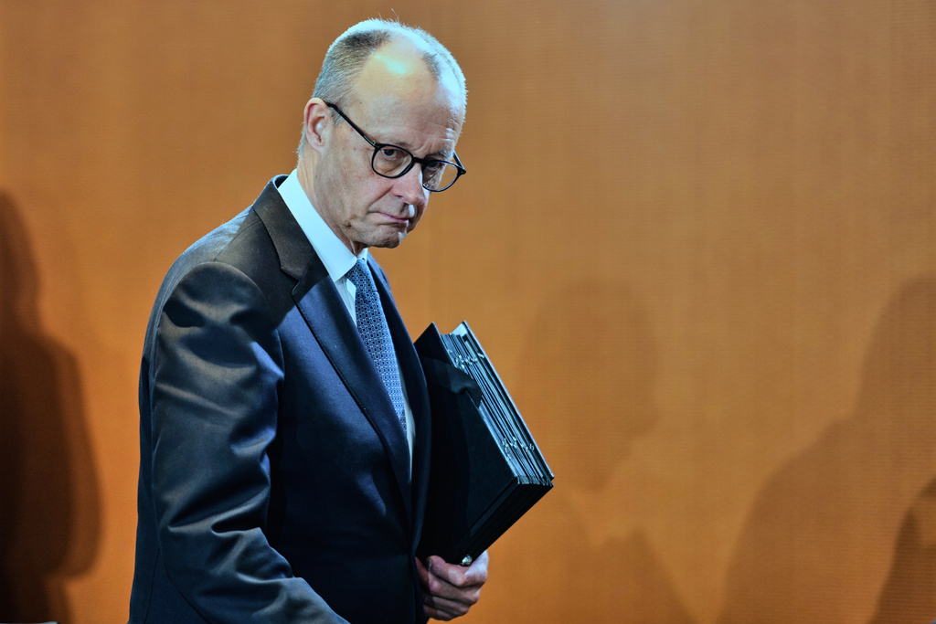 German Chancellor Friedrich Merz arrives for the cabinet meeting at the chancellery in Berlin, Germany, Wednesday, Jan. 28, 2026. (AP Photo/Markus Schreiber)