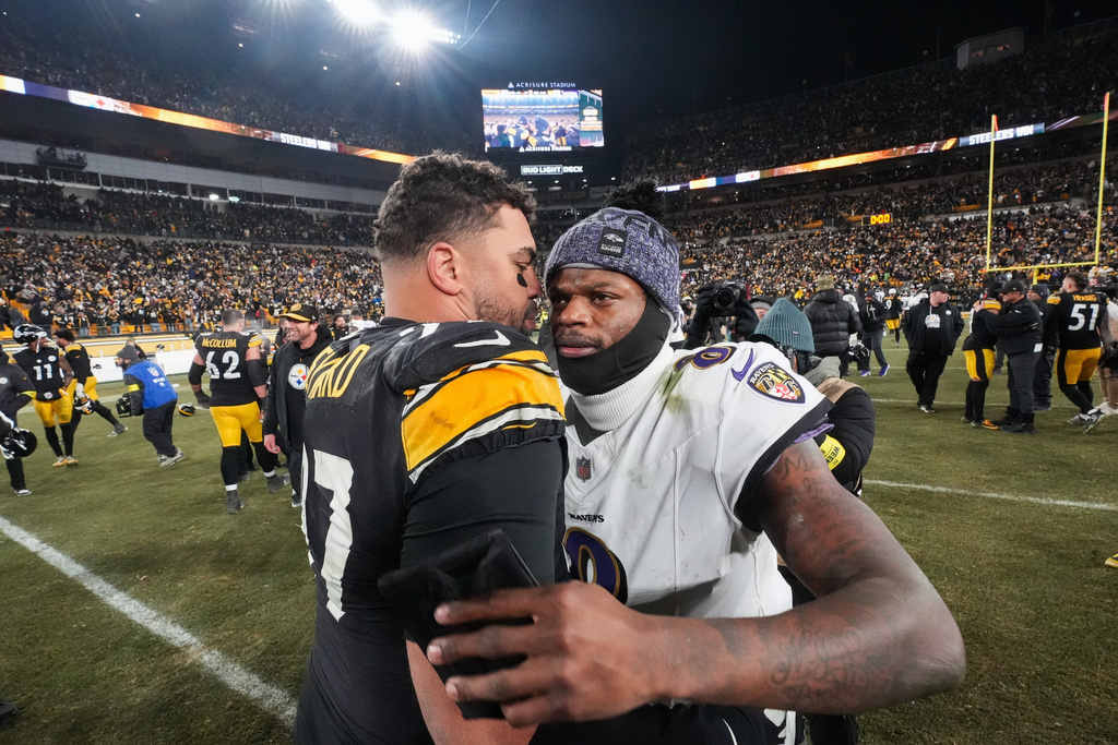 Pittsburgh Steelers defensive tackle Cameron Heyward, left, greets Baltimore Ravens quarterback Lamar Jackson (8) after an NFL football game Sunday, Jan. 4, 2026, in Pittsburgh. (AP Photo/Gene J. Puskar)