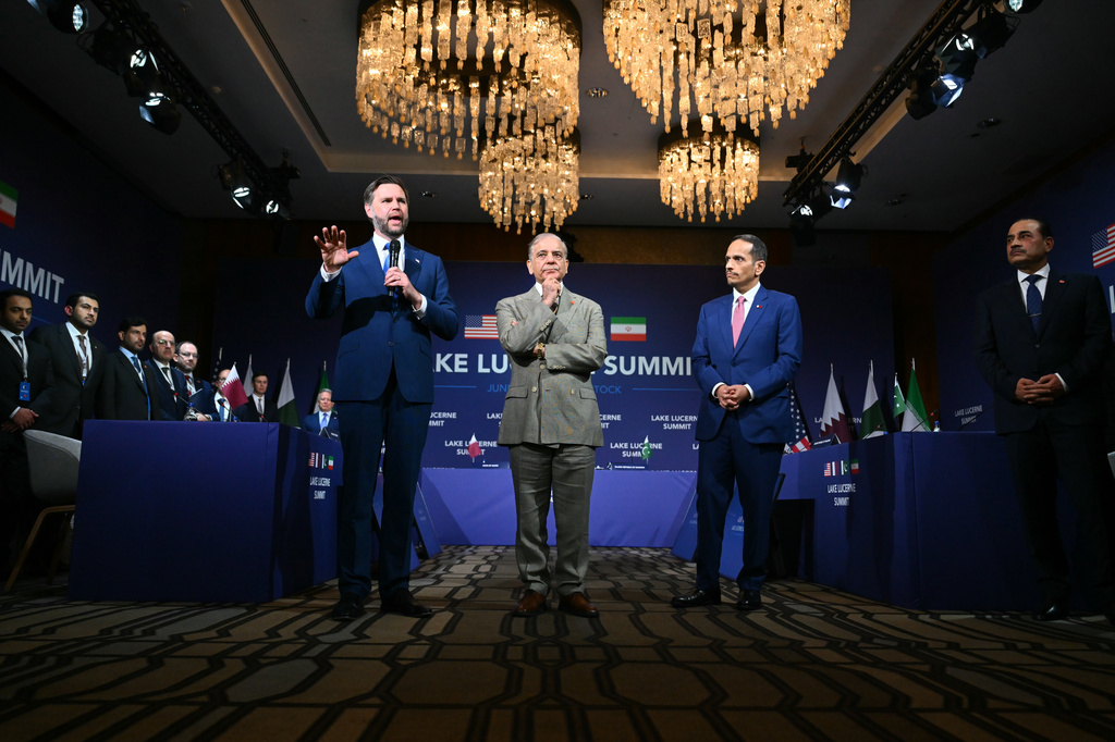 From left, US Vice President JD Vance speaks next to Pakistan's Prime Minister Shehbaz Sharif, Qatar's Prime Minister Sheikh Mohammed bin Abdulrahman bin Jassim al-Thani and Pakistan's Chief of Army Staff Field Marshal Asim Munir during a quadrilateral meeting between the United States, Iran, Pakistan and Qatar at the Burgenstock luxury hotel complex overlooking Lake Lucerne, Switzerland, Sunday June 21, 2026. (Fabrice Coffrini/Keystone via AP)