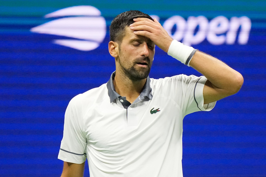 Novak Djokovic, of Serbia, reacts during the first round of the U.S. Open tennis championships against Mariano Navone, of Argentina, Sunday, Aug. 30, 2026, in New York. (AP Photo/Frank Franklin II)