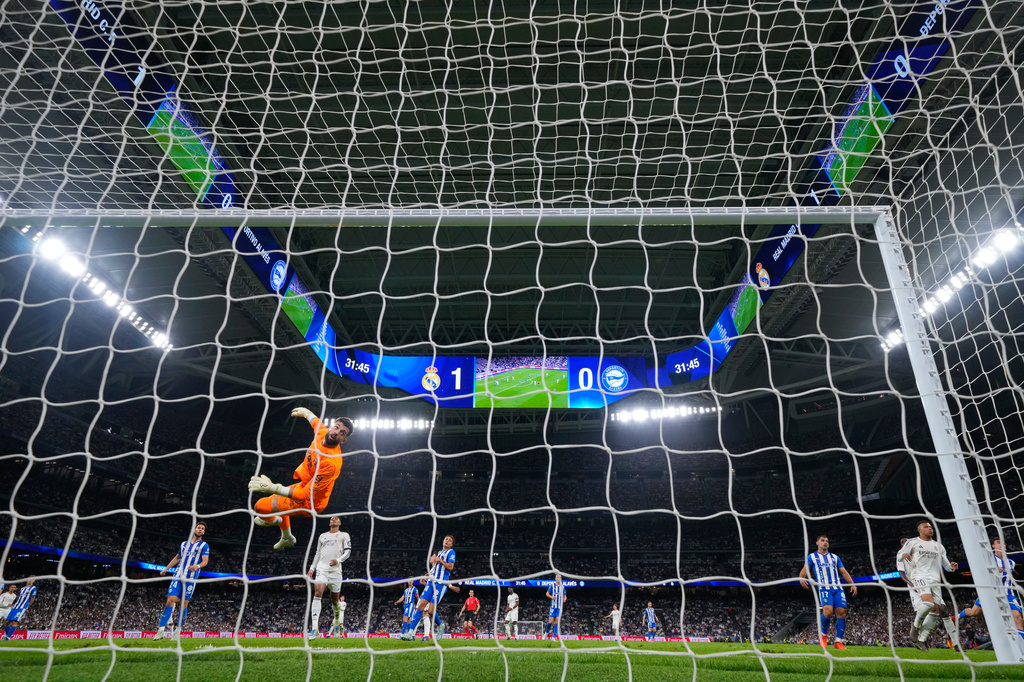 Alaves' goalkeeper Antonio Siverawatches ball go out of bounds during a La Liga soccer match between Real Madrid and Alaves in Madrid, Spain, Tuesday, April 21, 2026. (AP Photo/Manu Fernandez)