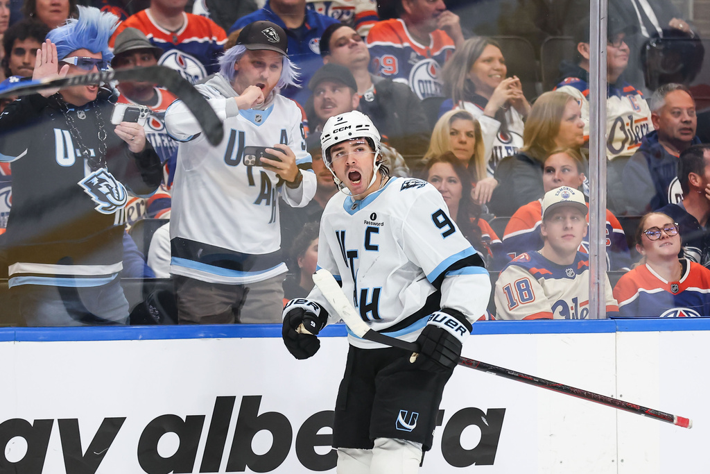 Utah Mammoth's Clayton Keller (9) celebrates a goal against the Edmonton Oilers during the third period of an NHL hockey game in Edmonton, Thursday, Oct. 15, 2026. (Codie McLachlan/The Canadian Press via AP)